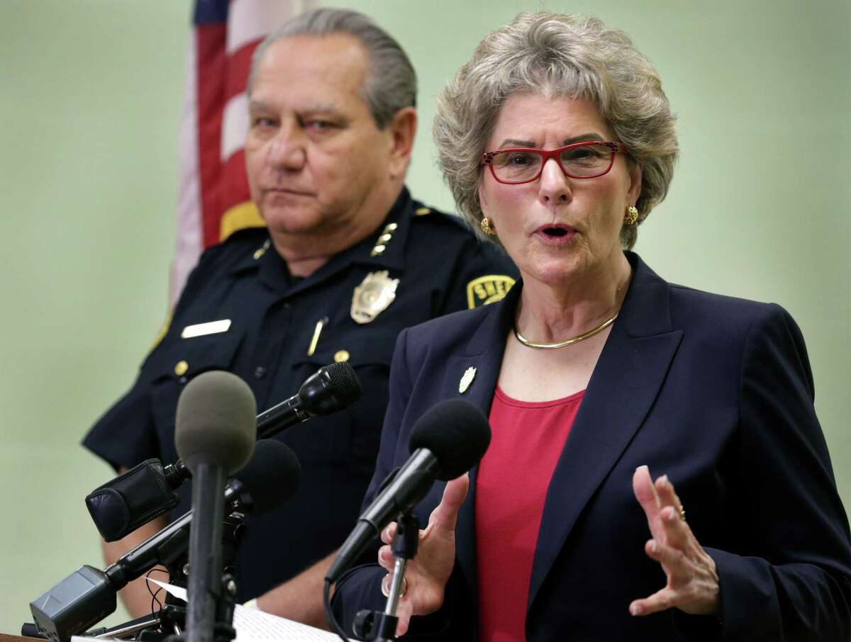 Bexar County Sheriff Susan Pamerleau, right, holds a press conference at the Bexar County Sheriff's Office on Wednesday, Sept. 2, 2015, dealing with the death of Gilbert Flores who was shot by Sheriff Deputies. At left is Chief Deputy Manuel Longoria.