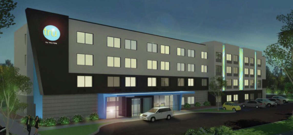 A four-story Tru by Hilton hotel is proposed for downtown Troy. The project is currently on hold.
