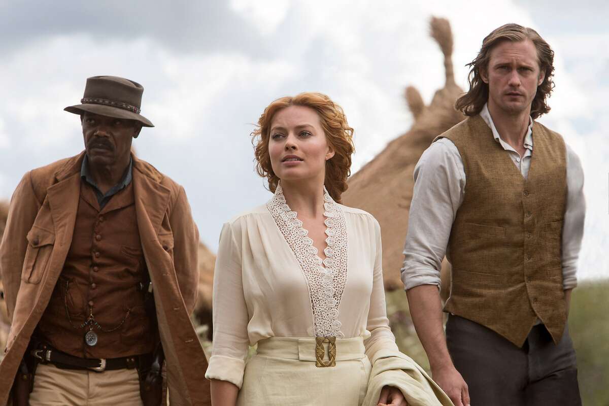 This image released by Warner Bros. Entertainment shows, from left, Samuel L. Jackson, Margot Robbie and Alexander Skarsgard in a scene from "The Legend of Tarzan." (Jonathan Olley/Warner Bros. Entertainment via AP)