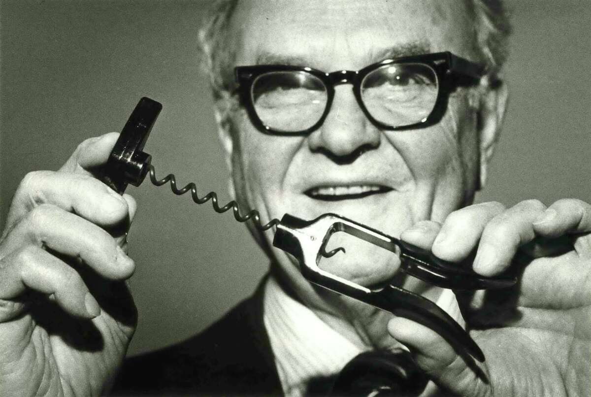﻿﻿Herbert Allen in 1980 with his invention, the Screwpull. Allen spent two years developing the wine opener, applying engineering principles and working from the basement of his River Oaks home. 