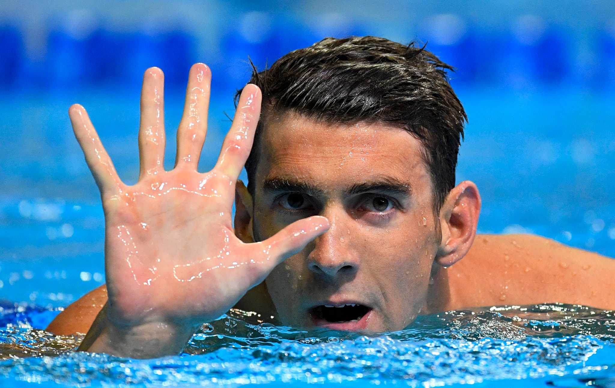 Michael Phelps first male swimmer to qualify for five Olympics(01)