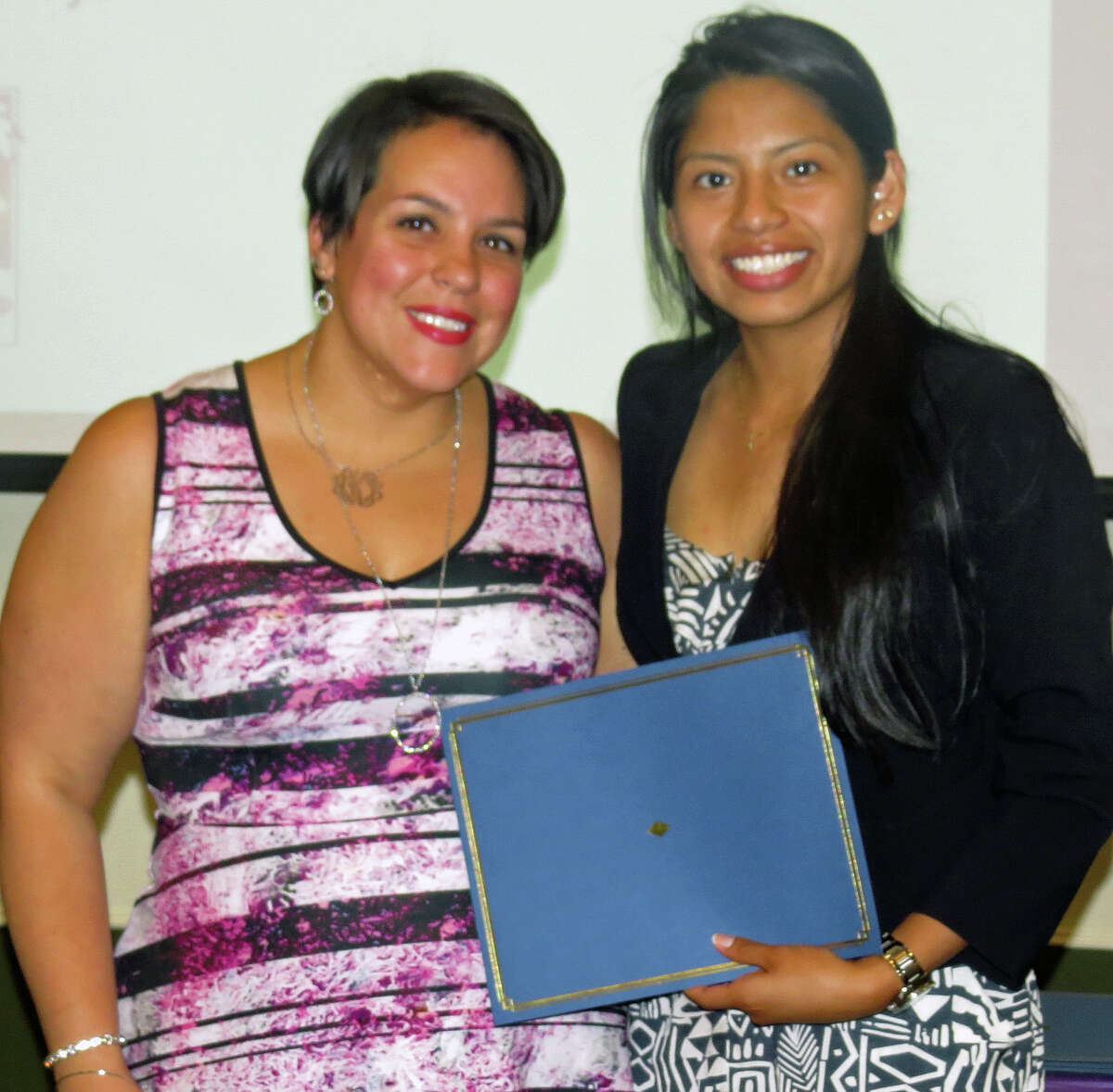 Abigail Kopp, chairwoman of the Latino Scholarship Fund, left, and Angelica Crespo, a scholarship winner from Danbury
