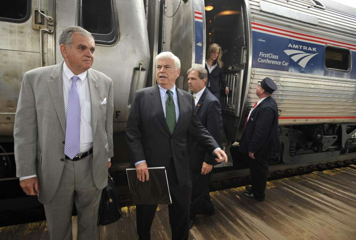 U.S. Transportation Secretary Ray LaHood, left, arrives with U.S. Sen. Christopher Dodd, second from left, by Amtrak train in Hartford, Conn., Monday, April 26, 2010. LaHood will be meeting with Connecticut officials to discuss proposed improvements to rail service between New Haven, Hartford and Springfield, Mass. (AP Photo/Jessica Hill)