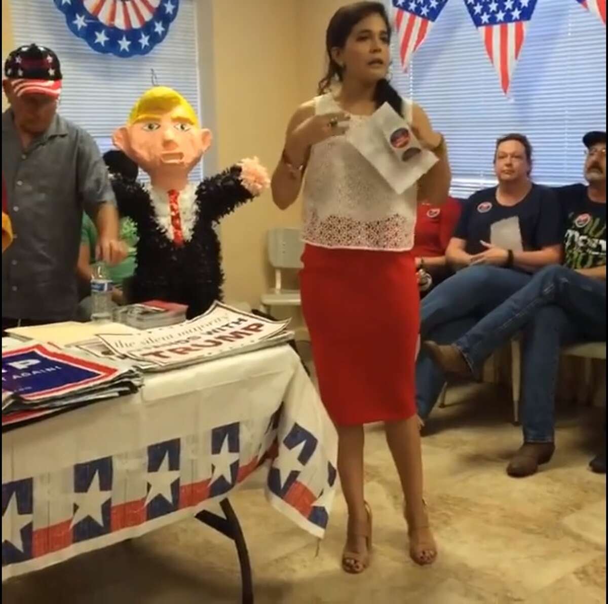 Miriam Cepeda, 24, campaigns for presumptive Republican nominee for president Donald Trump in Hidalgo County June 15.