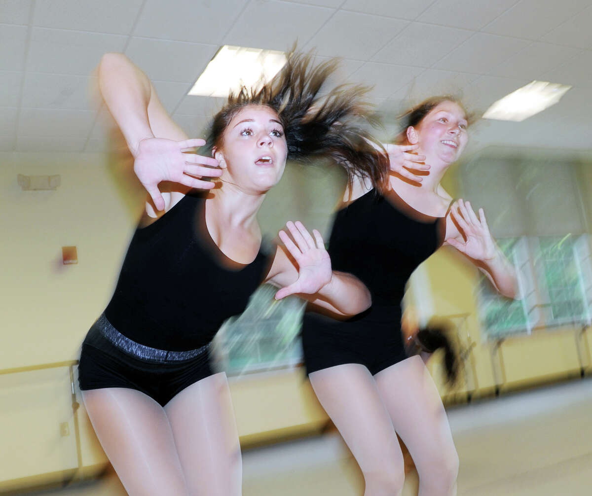 Kiersten Yusi, 13, left, and Caroline Sweeney, 16, work on a dance routine at the Western Greenwich Civic Center in the Glenville section of Greenwich, Conn., Wednesday, June 29, 2016. Both girls are a part of the Greenwich dance troupe, Ambassadors in Leotards, who will be traveling to and performiing in Germany in early July as goodwill dance ambassadors to raise money for a school there that serves the special education needs of German children.