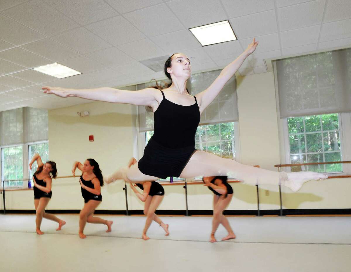 Catherine Esposito, 18, leaps during rehearsal at the Western Greenwich Civic Center in the Glenville section of Greenwich.