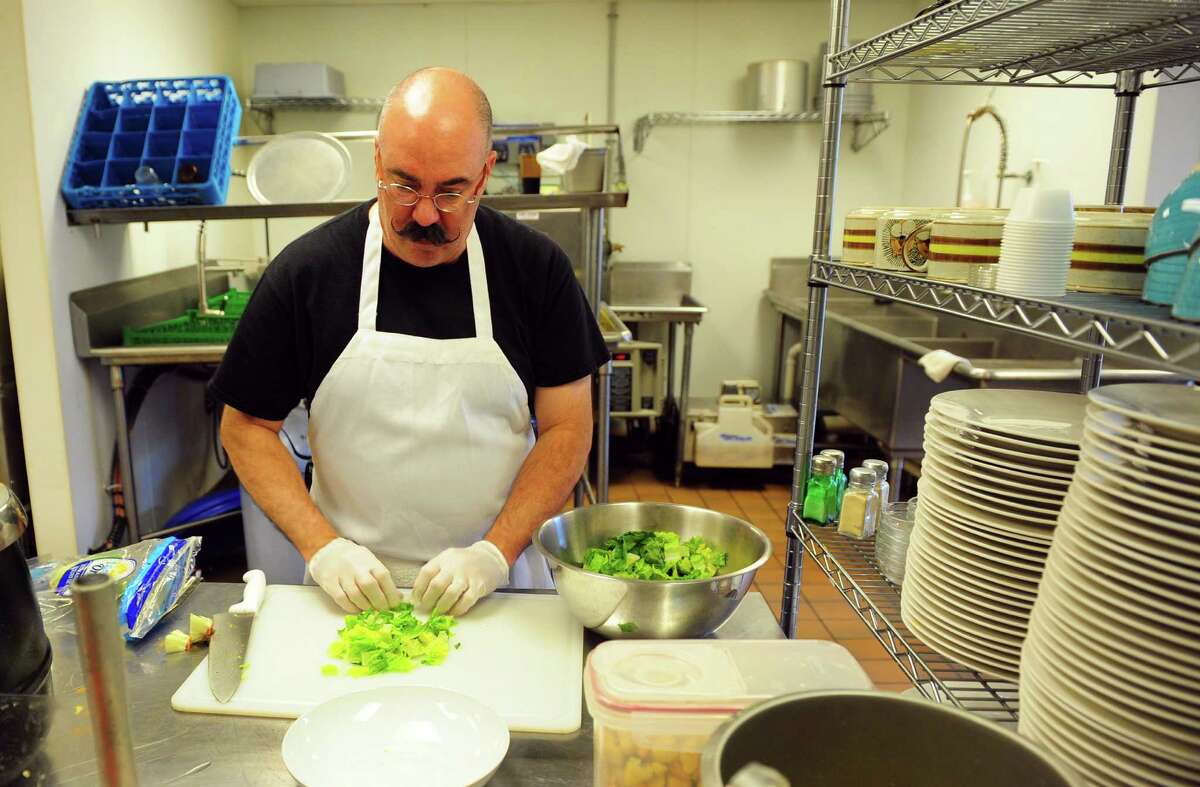 Owner John Spinetti works in the kitchen of Rosa Mina's in Ansonia. His Italian restaurant received an 'excellent' health inspection score on Jan. 25. Click through to see some of the cleanest restaurants in the Lower Naugatuck Valley, according to health inspection records.  