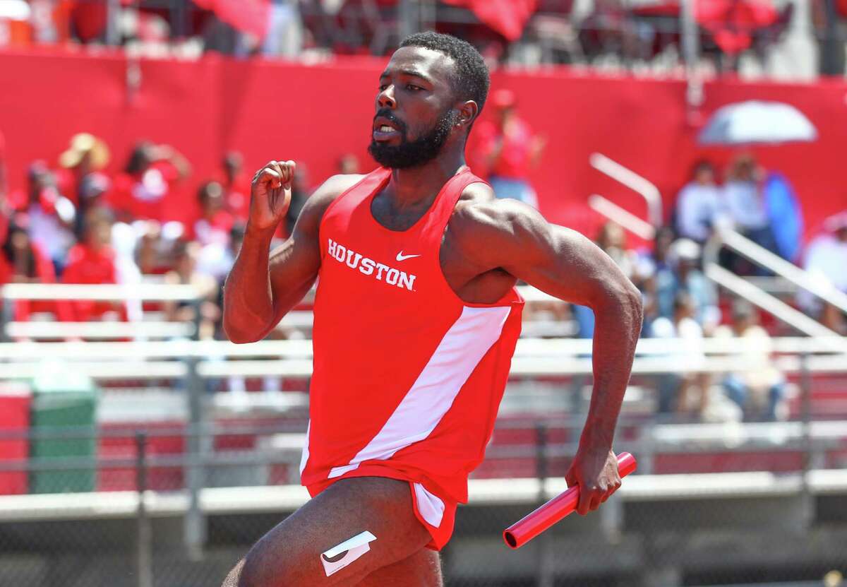 A pair of Cougars with Olympic aspirations - hurdler Issac Williams, left, and sprinter Cameron Burrell - will try to make the U.S. team this weekend.