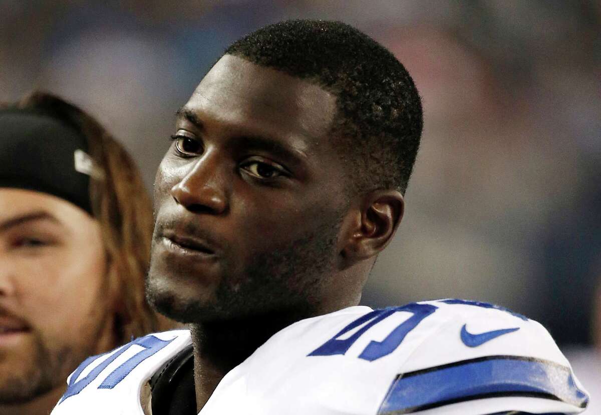 FILE - In this Aug. 28, 2014, file photo, Dallas Cowboys linebacker Rolando McClain watches from the sidelines during the fist half of an NFL preseason football game against the Denver Broncos in Arlington, Texas. A person with knowledge of the situation says McClain has been suspended for the first 10 games next season for his second violation of the NFL?s substance-abuse policy in as many years. (AP Photo/Brandon Wade, File)
