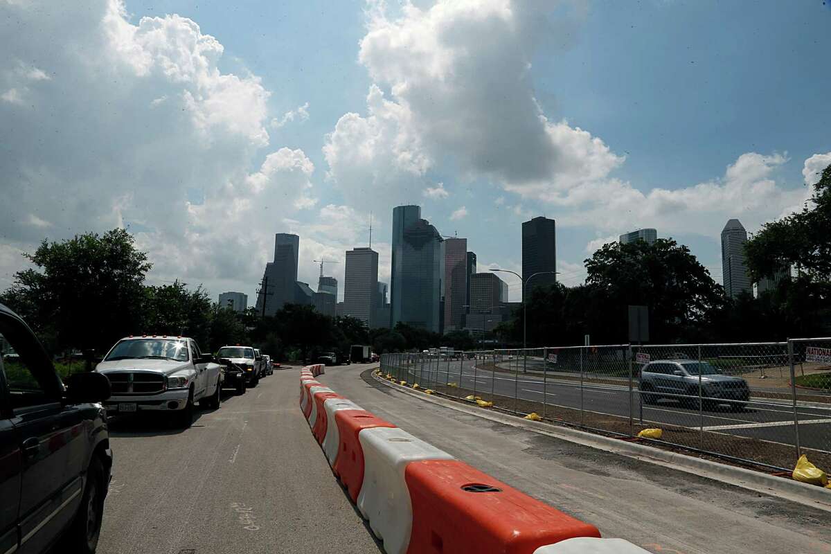 The former westbound lanes of Allen Parkway will be converted to 141 metered parking spaces after improvements are completed to the Buffalo Bayou Park area by late September. As of July 1, shown above, traffic is already on the new lanes.