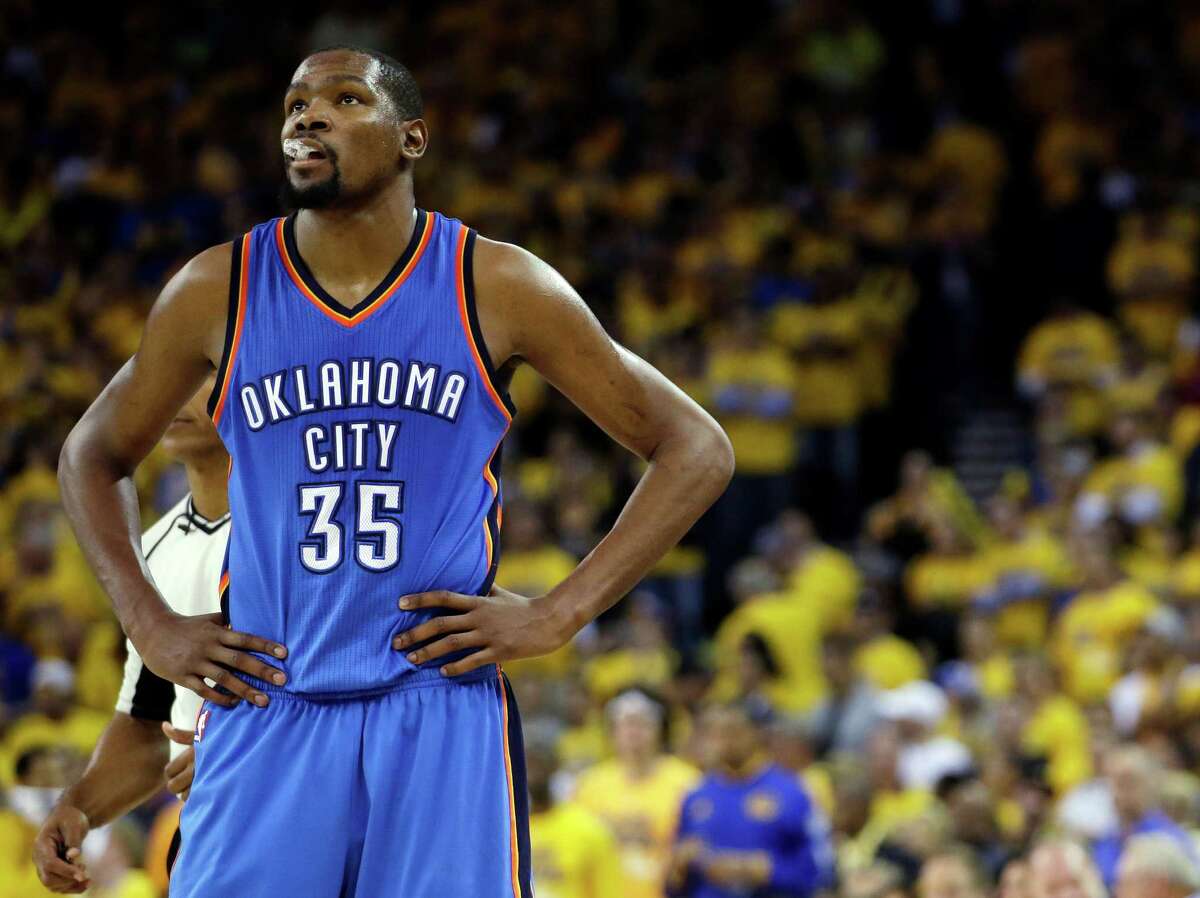 Oklahoma City Thunder’s Kevin Durant watches during the closing minutes of the second half in Game 5 of the Western Conference finals against the Golden State Warriors in Oakland, Calif., on May 26, 2016.