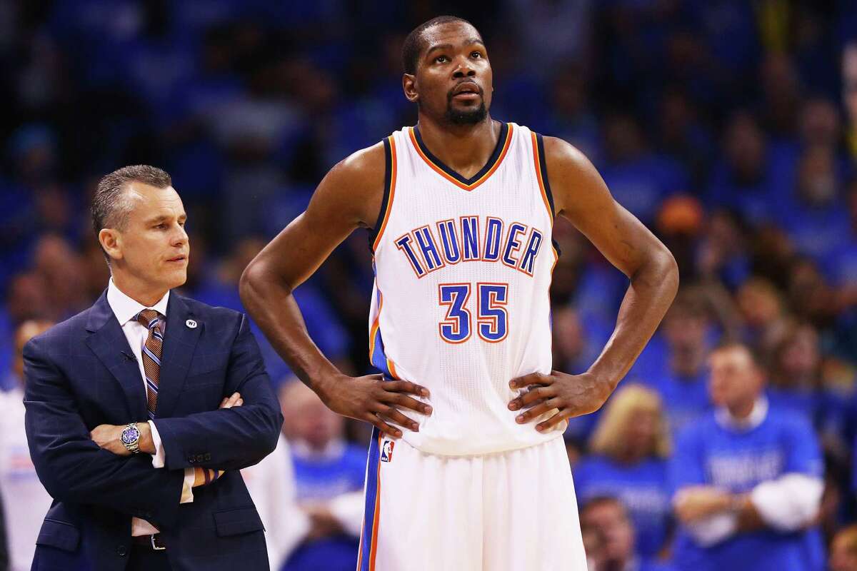 FILE - JULY 04: Oklahoma City Thunder free agent Kevin Durant announced that he will sign a reportedly two-year, $54 million contract with the Golden State Warriors. OKLAHOMA CITY, OK - MAY 28: Head coach Billy Donovan of the Oklahoma City Thunder talks with Kevin Durant #35 during the first half in game six of the Western Conference Finals against the Golden State Warriors during the 2016 NBA Playoffs at Chesapeake Energy Arena on May 28, 2016 in Oklahoma City, Oklahoma. NOTE TO USER: User expressly acknowledges and agrees that, by downloading and or using this photograph, User is consenting to the terms and conditions of the Getty Images License Agreement. (Photo by Maddie Meyer/Getty Images)