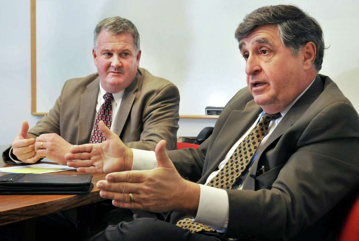 Schodack school superintendent Robert Horan, left, and Ichabod Crane interim superintendent Lee Bordick discuss their consolidation efforts at the Schodack Central School District offices Tuesday Jan. 10, 2012. (John Carl D'Annibale / Times Union)
