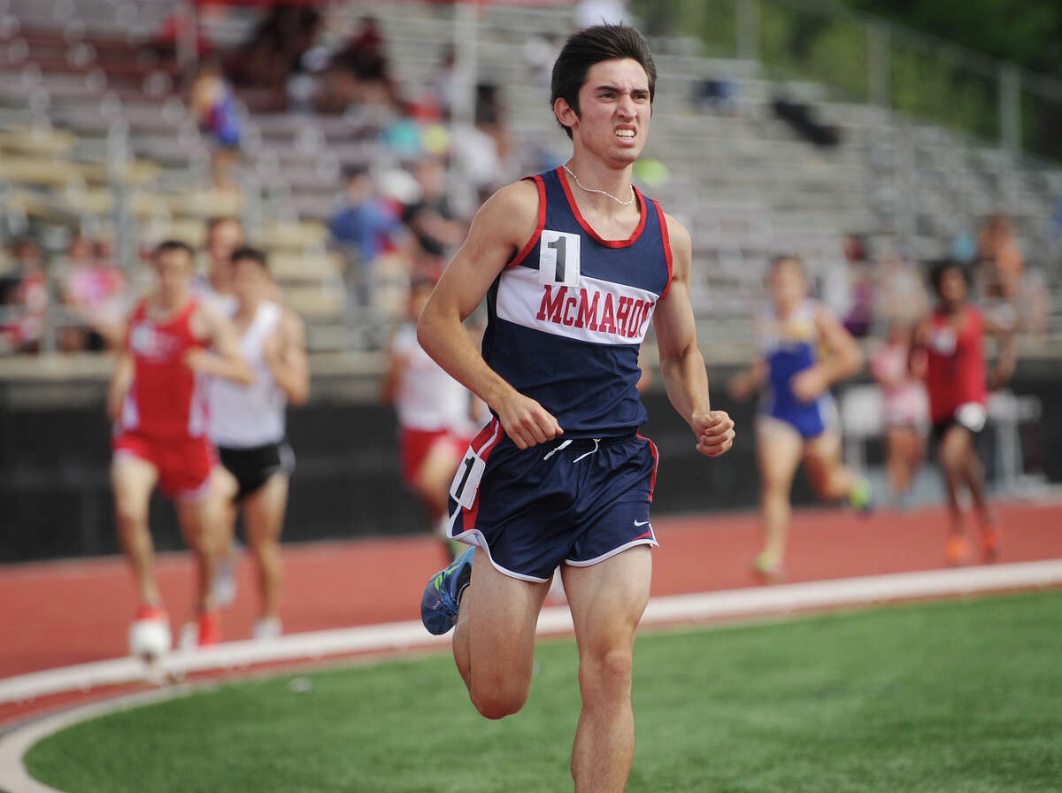 Brien McMahon's Eric VanDerEls races to a state record 4:08.42 in the 1600 meters at the CIAC Open outdoor track championships at New Britain Stadium on June 6.