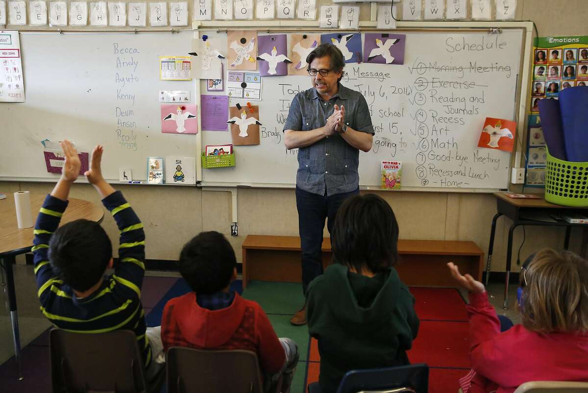 Special Education teacher George Keller leads the students in a goodbye song with clapping during the last class of the extended school year for special education students at Sunset Elementary School July 6, 2016 in San Francisco, Calif.