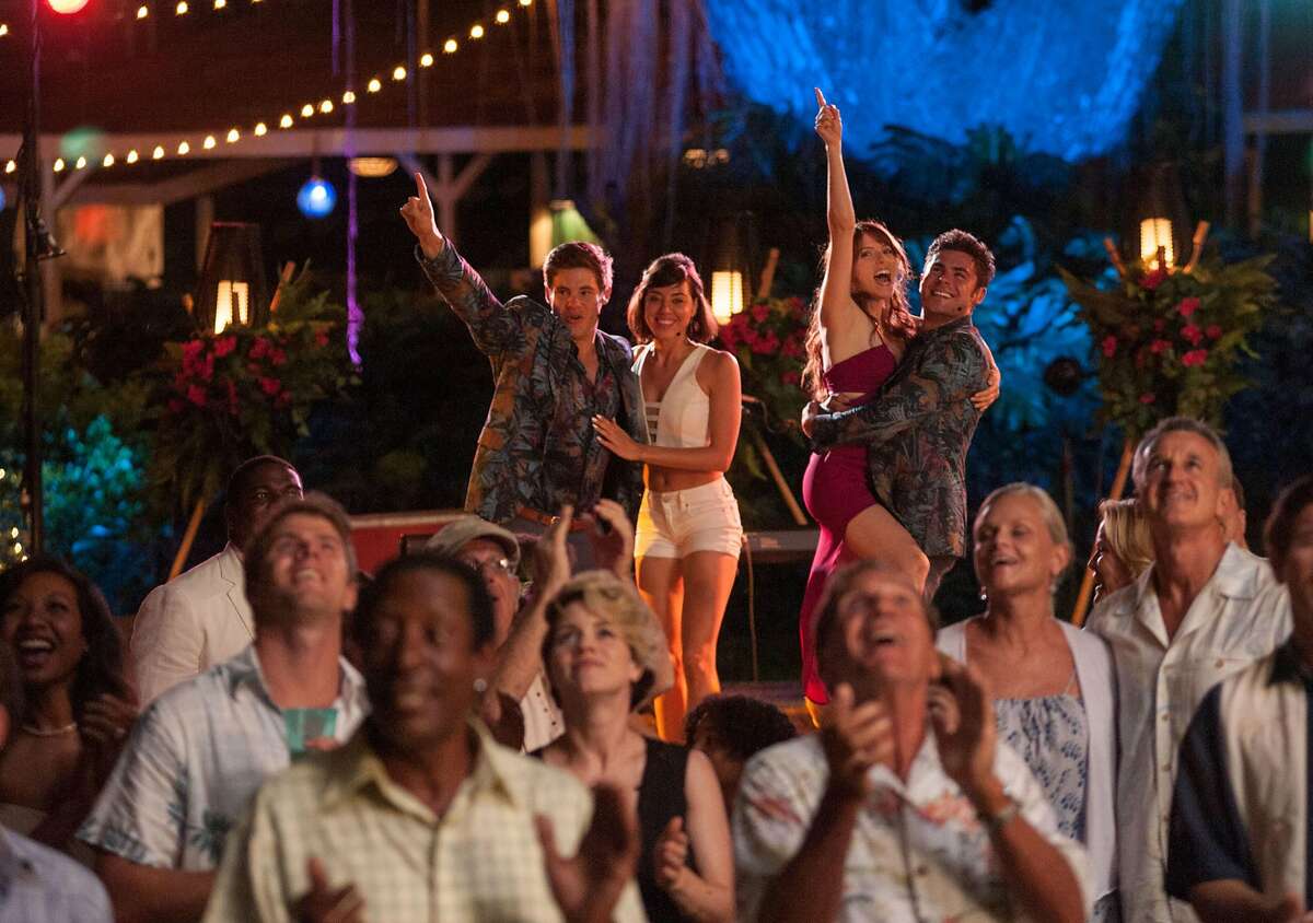 In this image released by 20th Century Fox, from left, Adam Devine, Aubrey Plaza, Anna Kendrick and Zac Efron appear in a scene from the film, "Mike and Dave Need Wedding Dates." (Gemma LaMana/20th Century Fox via AP)