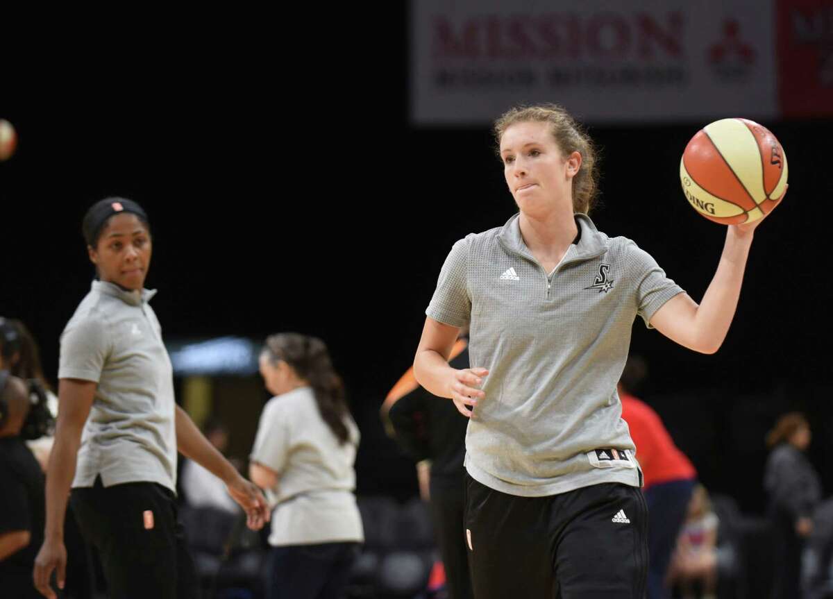Blake Dietrick of the San Antonio Stars warms up with teammates before their WNBA game against the Washington Mystics in the AT&T Center on Wednesday, July 6, 2016.