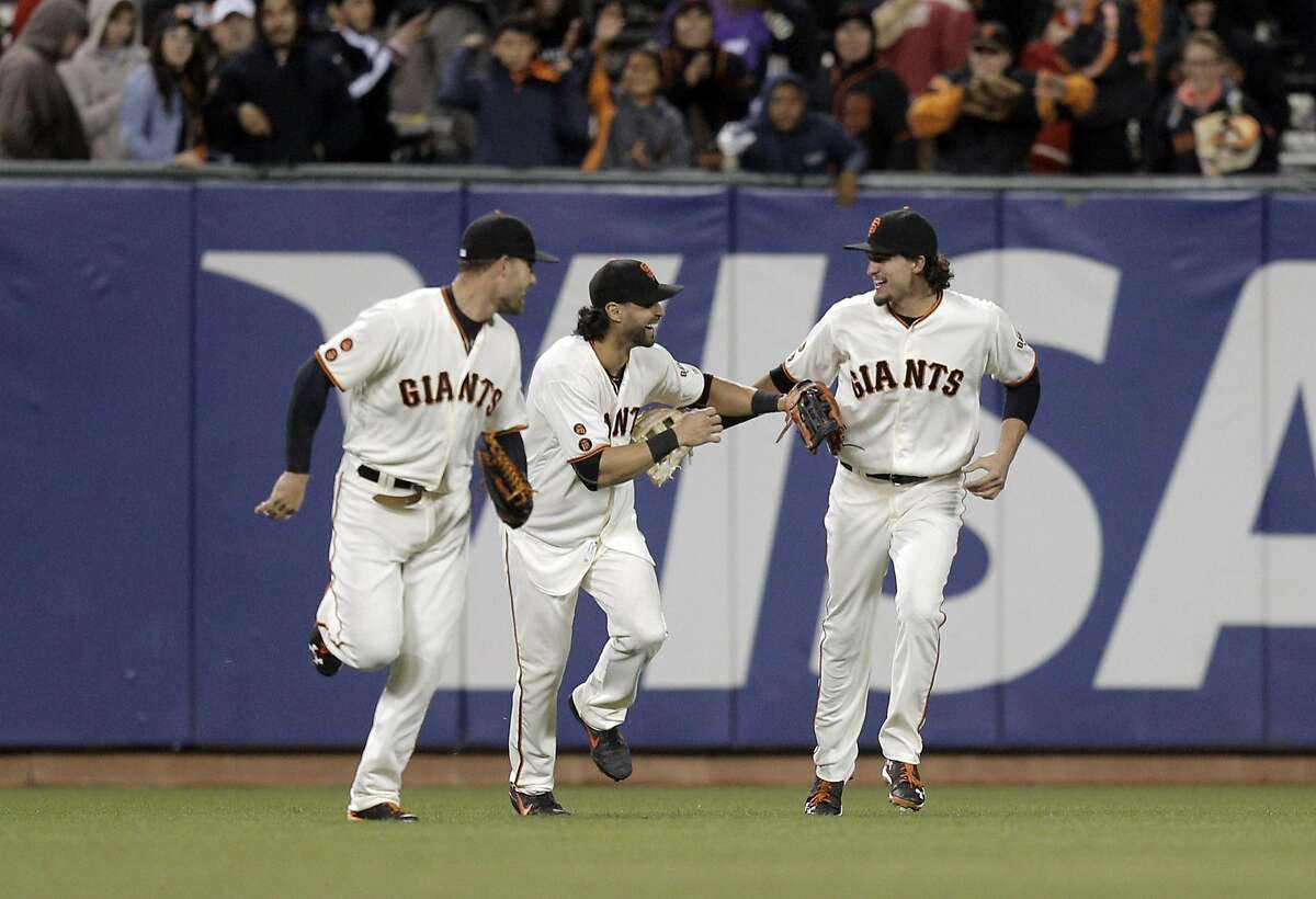 San Francisco Giants' Gorkys Hernandez reacts after a pop up fly