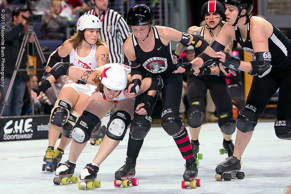 Bout scenes of the Texas Rollergirls.