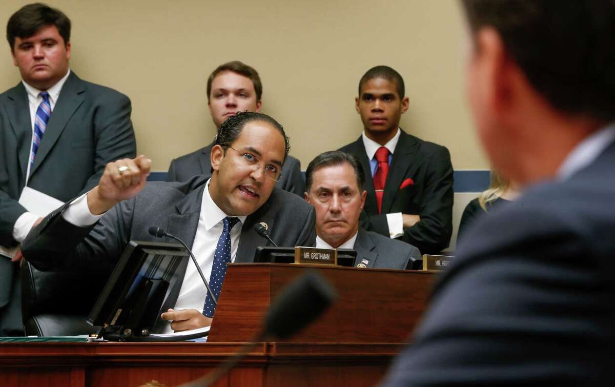 House Oversight and Government Reform Committee member Rep. Will Hurd, R-Texas, joined at right by Rep. Gary Palmer, R-Ala., questions FBI Director James Comey as he testifies on Capitol Hill in Washington, Thursday, July 7, 2016, before the committee's hearing to explain his agency's recommendation to not prosecute Democratic presidential candidate Hillary Clinton over her private email setup during her time as secretary of state. (AP Photo/J. Scott Applewhite)