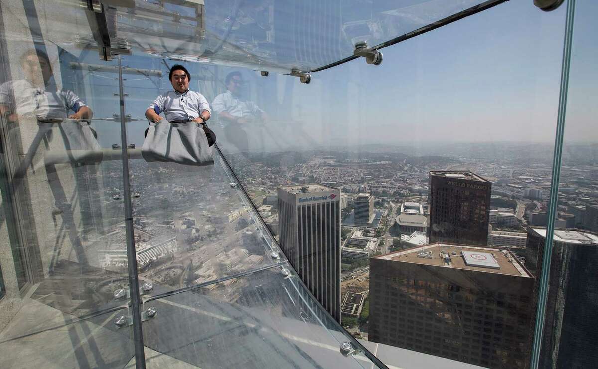 A four-second ride down the Skyslide at U.S. Bank Tower in Los Angeles gives a different kind of architectural experience at new tourist attraction.
