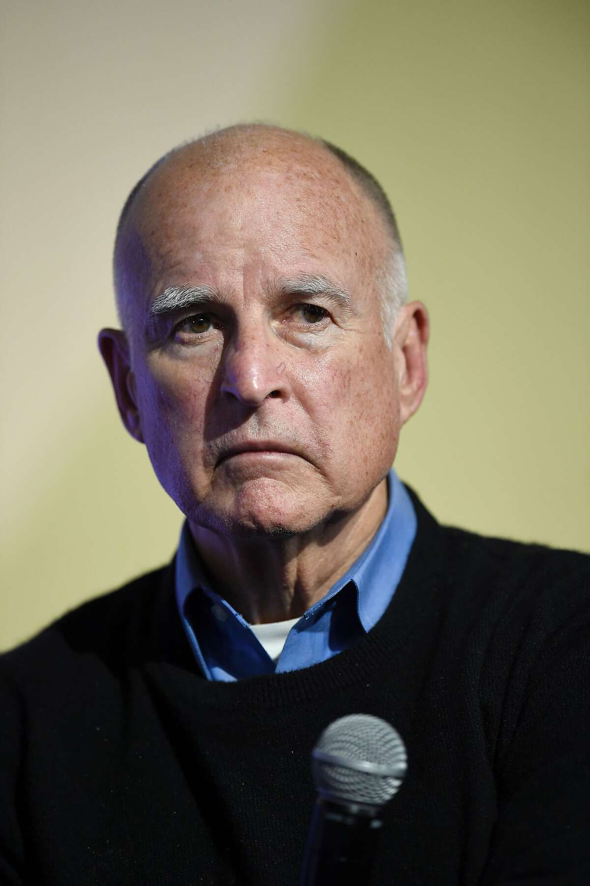 (FILES) This file photo taken on December 05, 2015 shows Governor of California Jerry Brown the COP21 United Nations conference on climate change in Le Bourget, France. California's governor approved a series of gun control measures on July 1, 2016, including new restrictions on assault weapons, in the wake of recent mass shootings across the country that have triggered outrage. Governor Jerry Brown signed into law six bills that were part of a package put before him by state lawmakers, further boosting firearms restrictions in one of the US states with the most stringent gun control laws. / AFP PHOTO / ERIC FEFERBERGERIC FEFERBERG/AFP/Getty Images