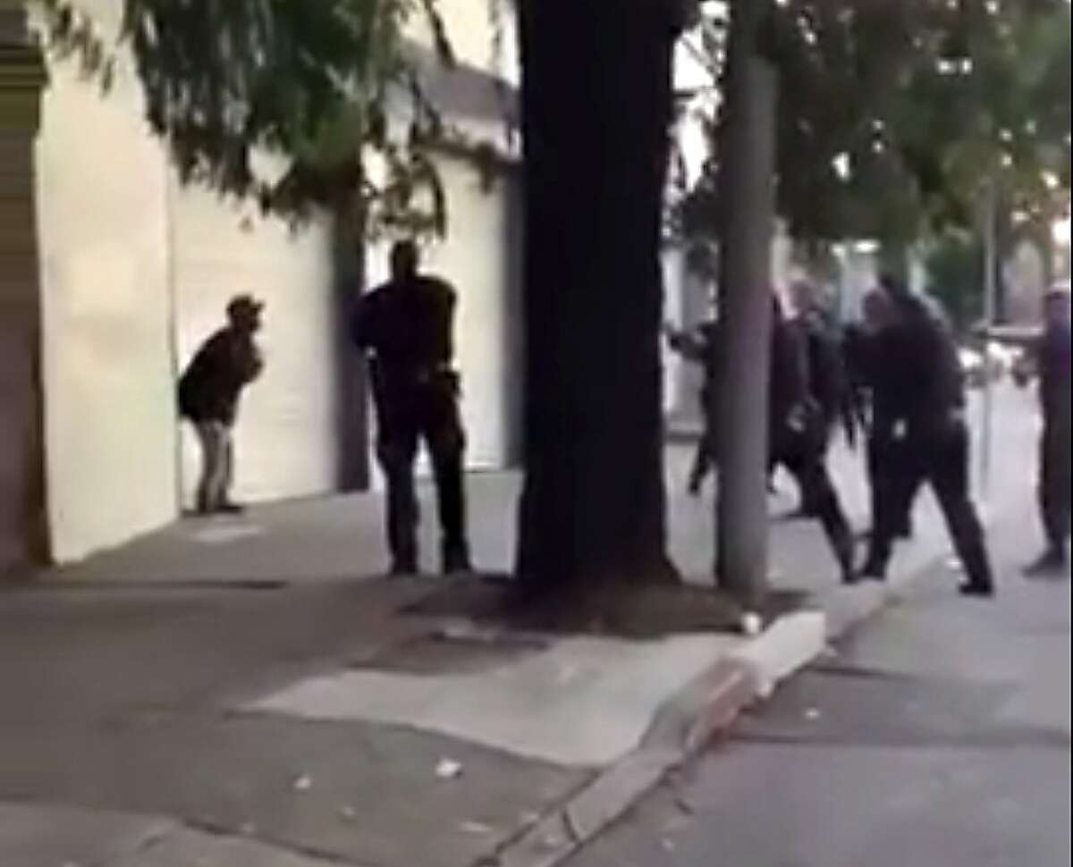 A frame grab from a video of the SFPD shooting of Mario Woods.