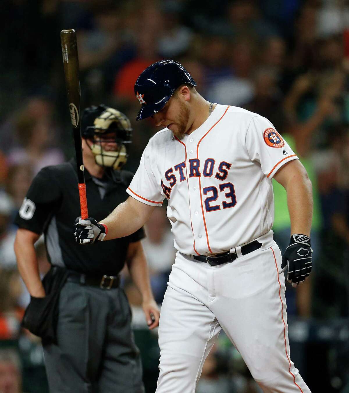Houston Astros A.J. Reed (23) reacts after striking out during the seventh inning of an MLB baseball game at Minute Maid Park, Thursday, July 7, 2016, in Houston.