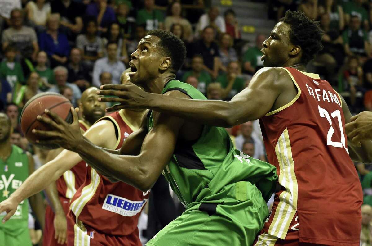 ASVEL’s French power forward Livio Jean-Charles (left) vies with SIG’s French center Bangaly Fofana (right) during a game on June 11, 2016, at the Astroballe stadium in Villeurbanne.