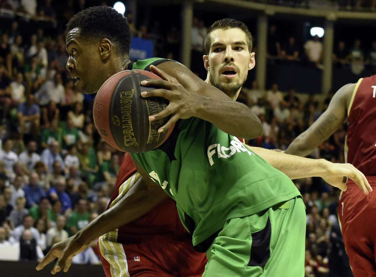 ASVEL’s French power forward Livio Jean-Charles (left) vies with SIG’s French small forward Jeremy Leloup (right) during a game on June 11, 2016, at the Astroballe stadium in Villeurbanne.