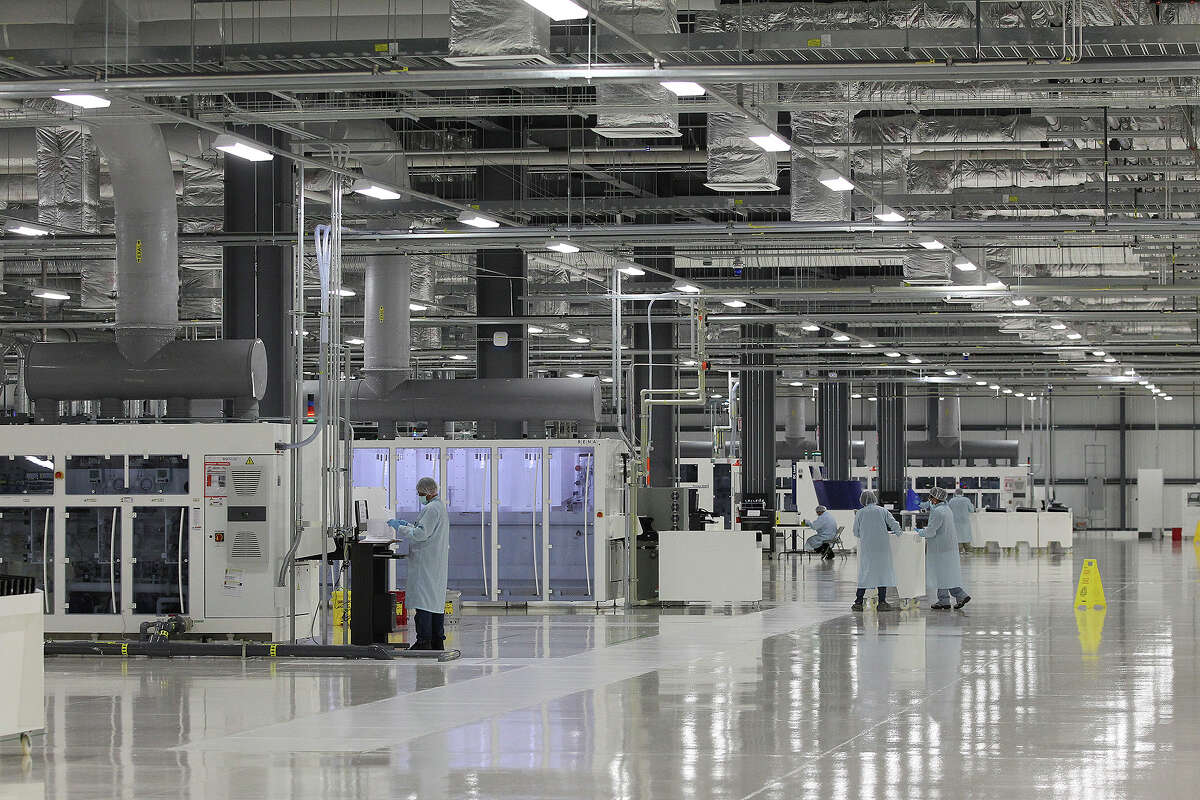 File photo of Mission Solarat its Brooks City Base location in San Antonio. The local solar panel maker is outsourcing its cell manufacturing to Asia, where the parts can be purchased cheaper than they can be made here.