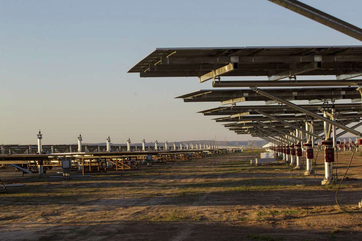 Solar panels stand at OCI Solar Power’s 110-megawatt Alamo 6 solar farm in Pecos County. CPS Energy is committed to buying power from the facility, which is being purchased by an undisclosed buyer for $385 million.