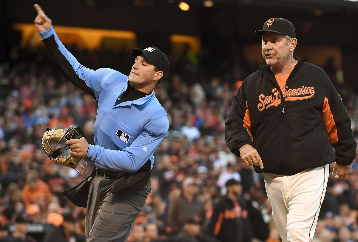 Giants manager Bruce Bochy in the dugout with his wife Kim Bochy News  Photo - Getty Images