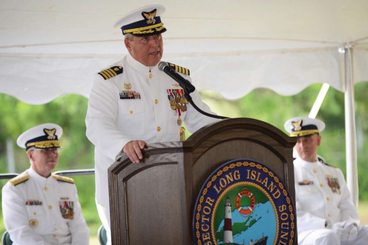 Capt. Edward Cubanski, commander of Coast Guard Sector Long Island, speaks to the crowd during a change of command ceremony at the sector in New Haven, Connecticut, July 8, 2016. The change of command is a transfer of responsibility and authority from one individual to another.