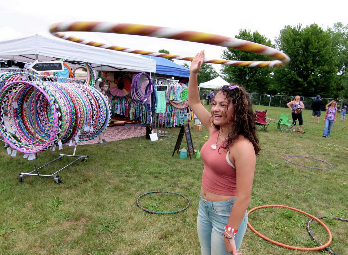 Christina Hernandez, of Shelton, enjoys the 7th Annual Soupstock Music and Arts Festival in Shelton, Conn. on Saturday July 9, 2016. Soupstock features 2 stages of live music, a chili competition on Sunday, Kids Zone, over 50 handmade artisans, an Artisan Expo Pavilion, a variety of food trucks and more. The festival continues on Sunday from 11 a.m. to 8 p.m.