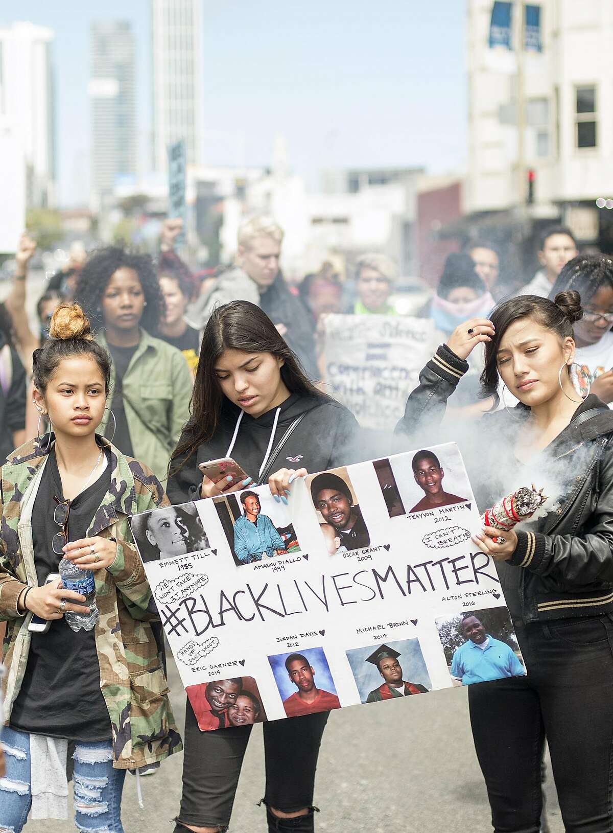 Protesters surround the intersection of 5th and Bryant in San Francisco on July 09, 2016. A crowd of about 300 people marched through the streets taking over various intersections throughout San Francisco shouting slogans like "black lives matter" among others.