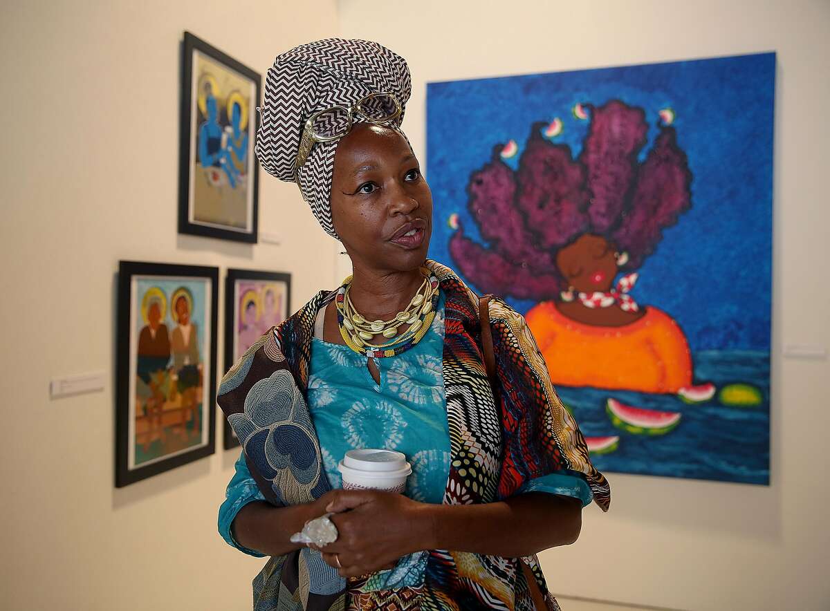 Artist/curator Karen Seneferu talks about the new "The Black Woman is God" exhibit at the SOMArts show on Friday, July 8, 2016, in San Francisco, Calif.