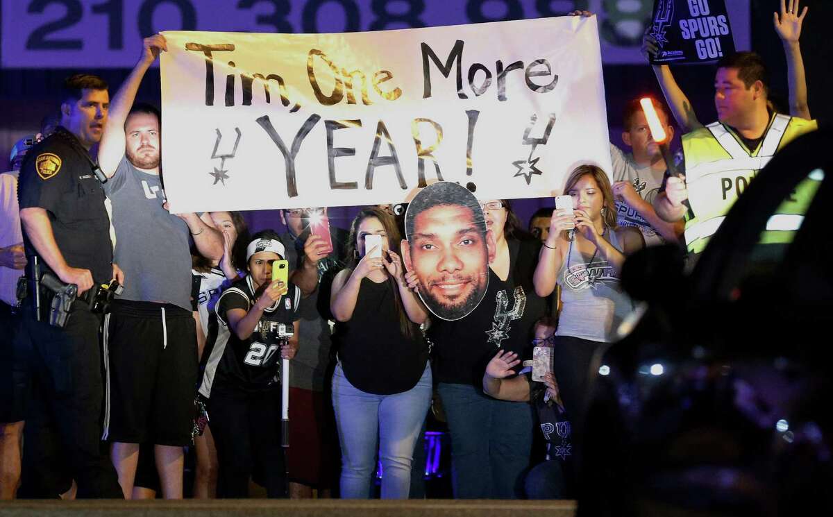 Fans show their support for Tim Duncan as the San Antonio Spurs return home after losing in Game 6 of the Western Conference semifinals to the Oklahoma City Thunder on Friday, May 13, 2016. Hundreds of fans came out to the private terminal as a show of support for the team and especially for Tim Duncan who may be retiring after playing his entire career in the NBA with the Spurs for 19 seasons. (Kin Man Hui/San Antonio Express-News)