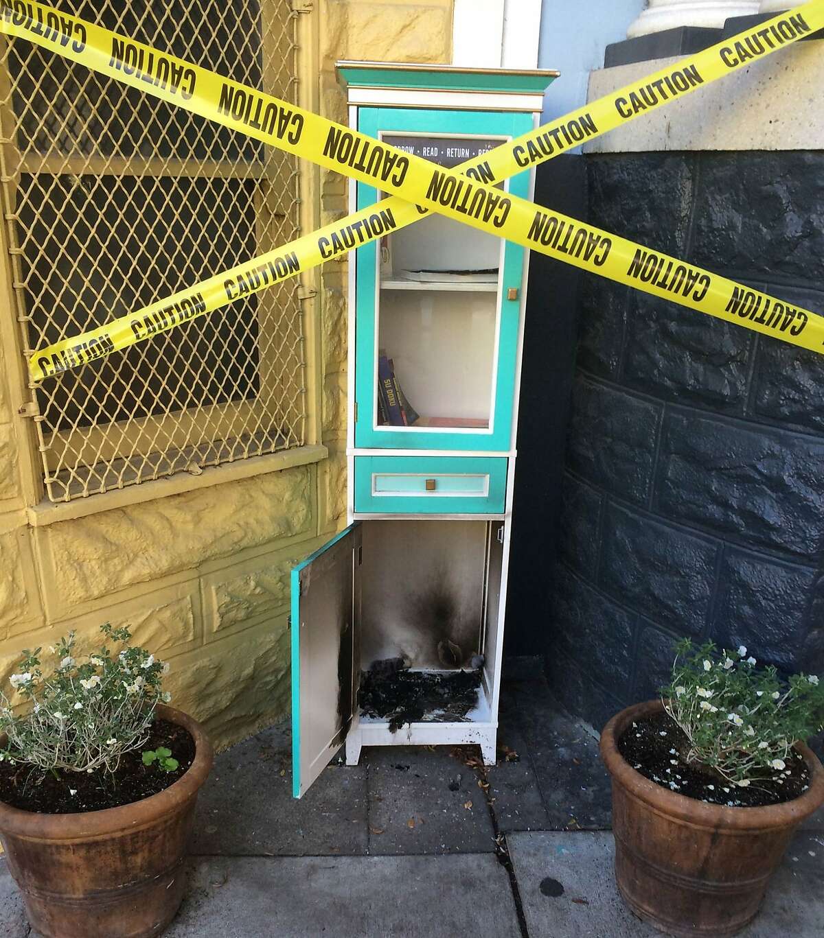 The Noe Street LFL (Little Free Library) is seen after an arson incident in this undated photo in San Francisco, Calif.