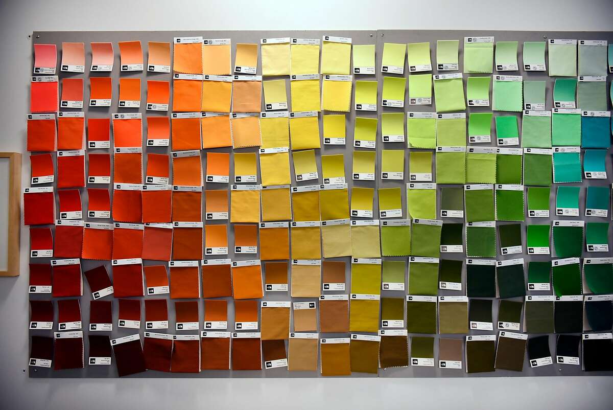 Color swatches are seen on a wall in the Quality Assurance lab at The North Face's headquarters in Alameda, Calif., on Monday, July 11, 2016.