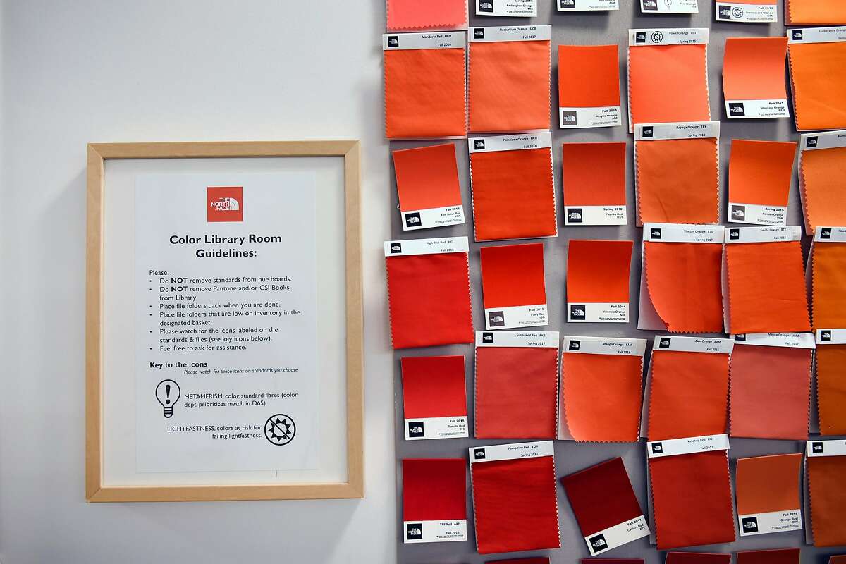 Color swatches are seen on a wall in the Quality Assurance lab at The North Face's headquarters in Alameda, Calif., on Monday, July 11, 2016.