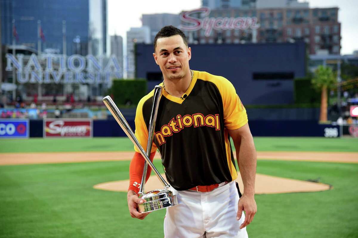 SAN DIEGO, CA - JULY 11: Giancarlo Stanton of the Miami Marlins celebrates after winning the T-Mobile Home Run Derby at PETCO Park on July 11, 2016 in San Diego, California.