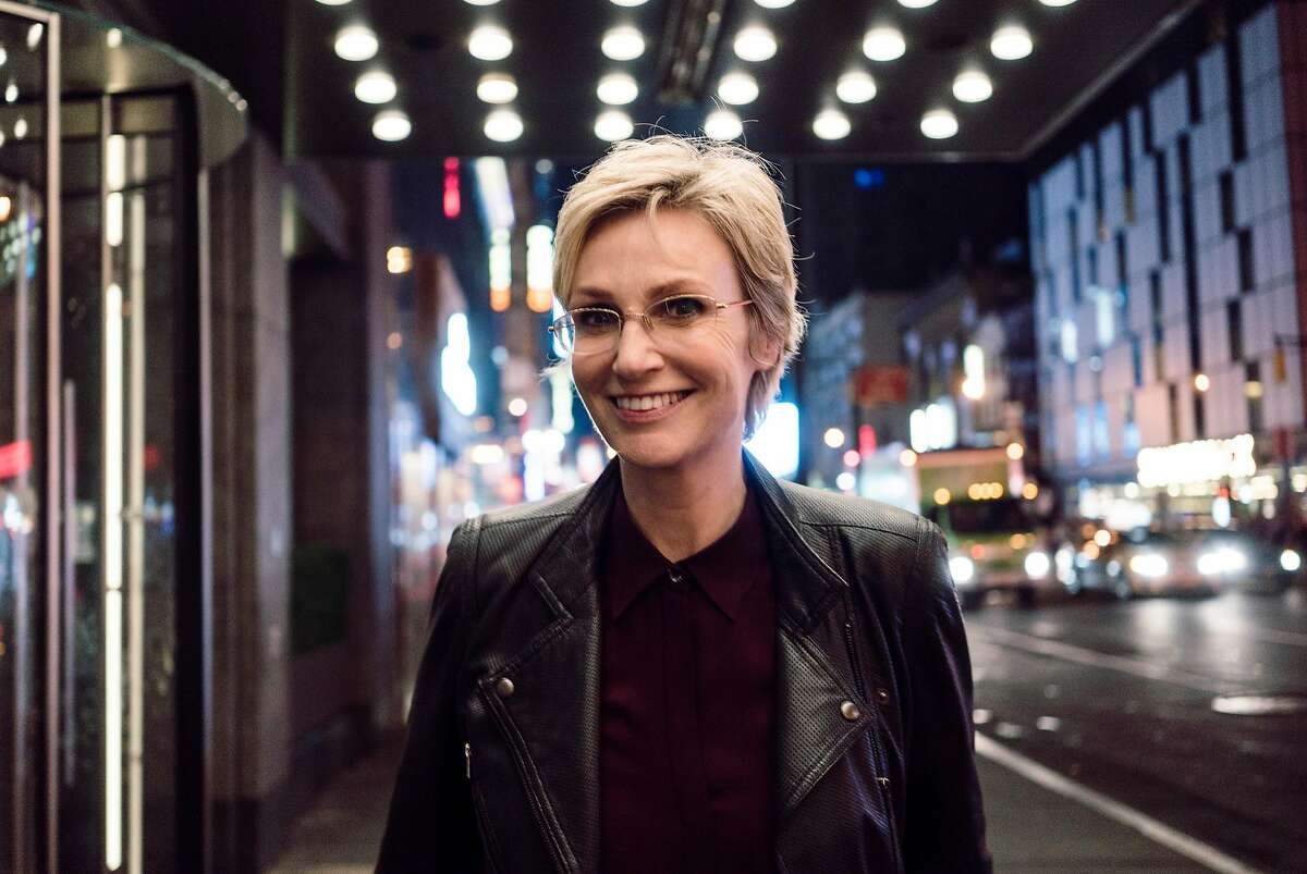 FILE-- Jane Lynch, the actress and former �Glee� star, walks up the street after leaving the St. James Theatre, in New York, July 7, 2015. "The first gay bar I ever went to was the Cubbyhole when it was on Hudson Street in the West Village. It would have been around 1984, which made me 23-ish and I was fresh out of graduate school. I looked very straight and very Midwestern cornfed. I walked around the block before I got the nerve to go in because the lady bouncers looked so fearsome and eyed me suspiciously. When I finally tried to walk in, the door lady stopped me and asked: �Do you know where you are? This is a lesbian bar.� �Yeah, I know,� I said nonchalantly, as if I�d been walking into dyke bars since the beginning of time," said Lynch. (An Rong Xu/The New York Times)