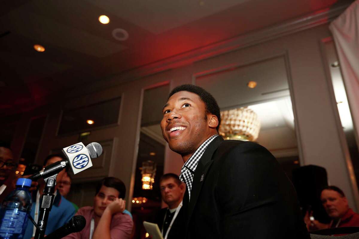 Texas A&M defensive linebacker Myles Garrett speaks to the media at the Southeastern Conference NCAA college football media days, Tuesday, July 12, 2016, in Hoover, Ala. (AP Photo/Brynn Anderson)