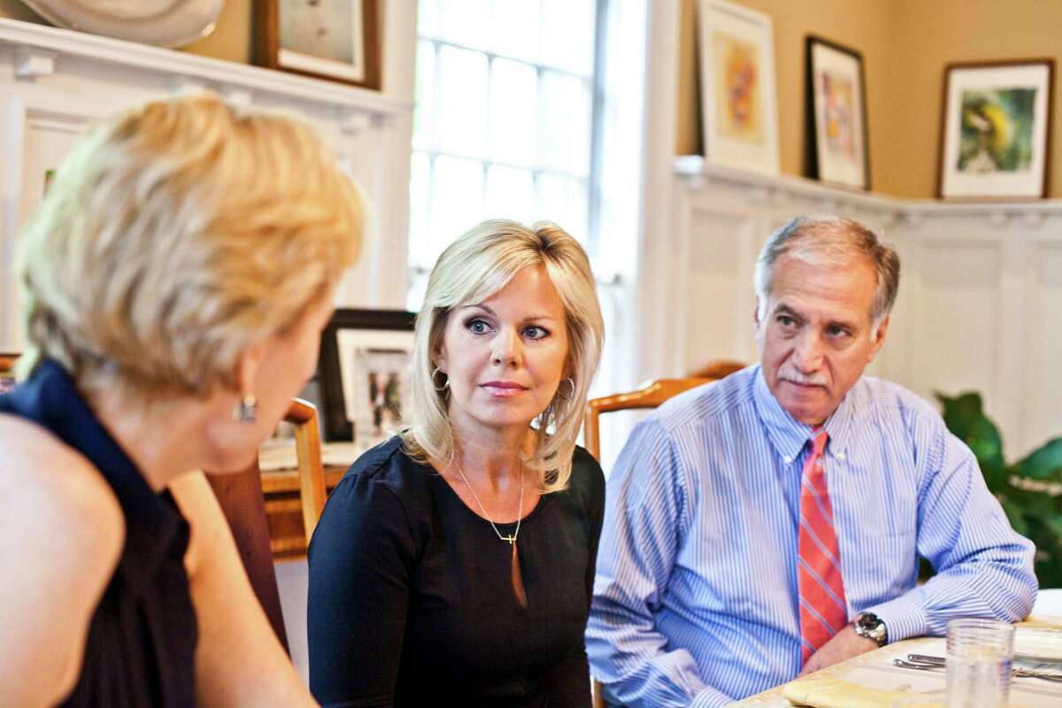 Gretchen Carlson, center, with her attorneys Martin Hyman, right, and Nancy Erika Smith at SmithÂ?’s home in Montclair, N.J., July 12, 2016. In a first public statement since her sexual harassment suit against Fox News boss Roger Ailes, Carlson said that she felt it was finally time to speak up. Â?“I just wanted to stand up for myself, first and foremost,Â?” she said. (Bryan Anselm/The New York Times)