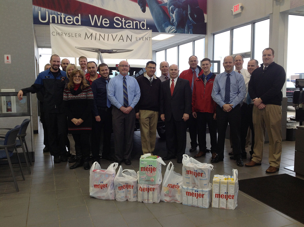 Feeny Midland fills truck for food drive