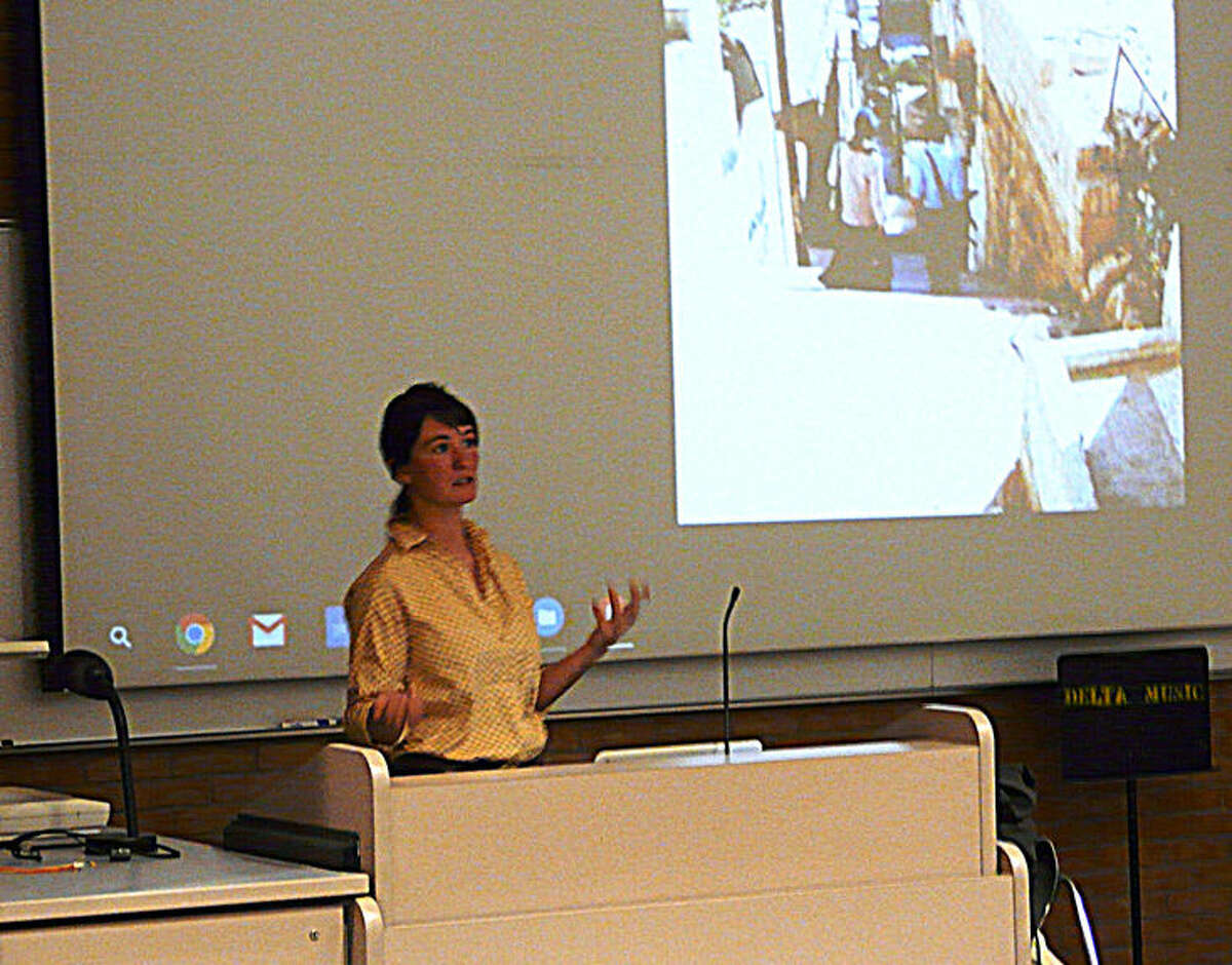 Sarah Longstreth, a Hope organic farmer, talks about her experience living and working on family farms in the Middle East during a presentation at Delta College. Longstreth spent 12 years working in Maine and Minnesota at various farms before returning home to launch Good Stead Farm in Hope.