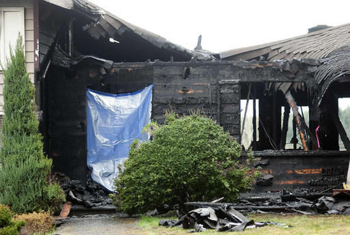 This is the scene of a fire where three children perished Friday in Centralia, Wash. Authorities say their mother wasn't able to rescue them as they slept upstairs. Police in the city of Centralia say the fire woke the woman sleeping downstairs and she couldn't get to her children.