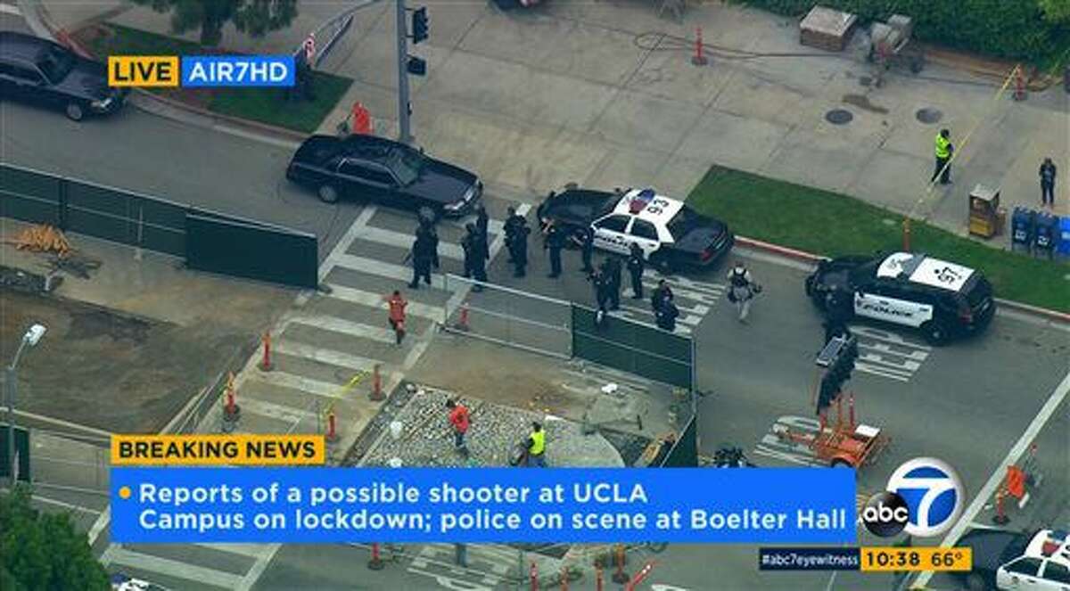 In this image made from video, police respond to a report of a possible shooter at the University of California, Los Angeles, Wednesday, June 1, 2016, in Los Angeles. (KABC-7 via AP) MANDATORY CREDIT