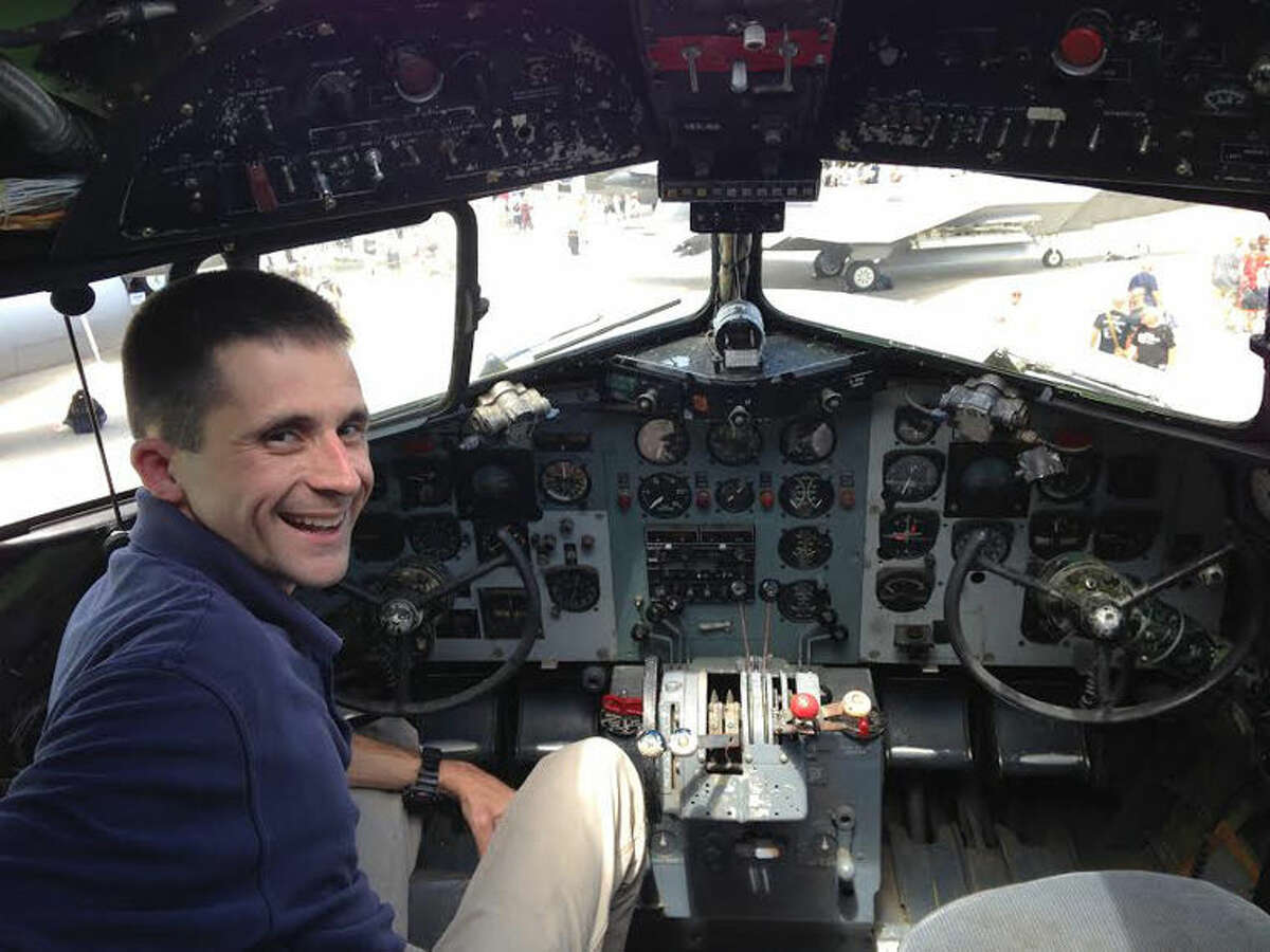 Matt Scales, a member of the Alabama Air National Guard, sits in the cockpit of That’s All Brother in 2015. After reading the story of Victor Nelson in the Midland Daily News on Oct. 30, 2013, Scales contacted Victor’s son, Chip, looking to learn more about That’s All Brother.